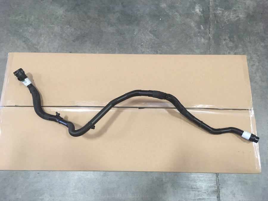 Pump 1 to Tunnel Hose (Powertrain) - Tesla part photo (1077592-77-F)