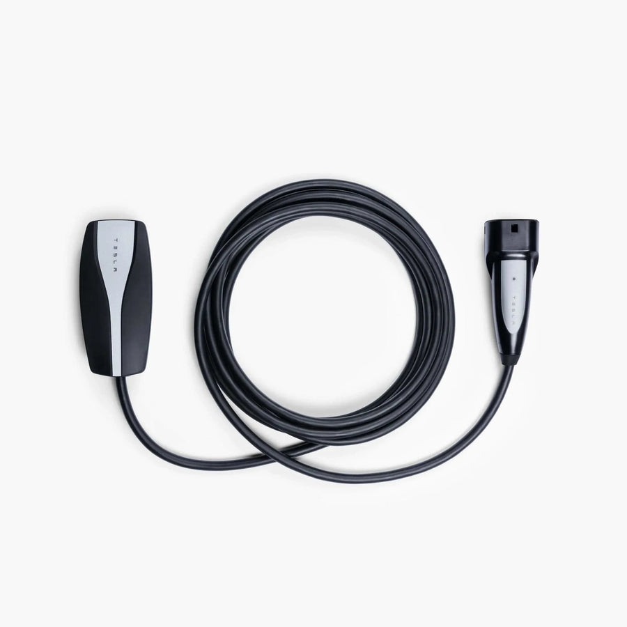 Tesla Universal Mobile Connector EU (Type 2) 1121254-00-G - studio photo, mobile connector with Type 2 handle and the cable coiled - Original / EU (Type 2)